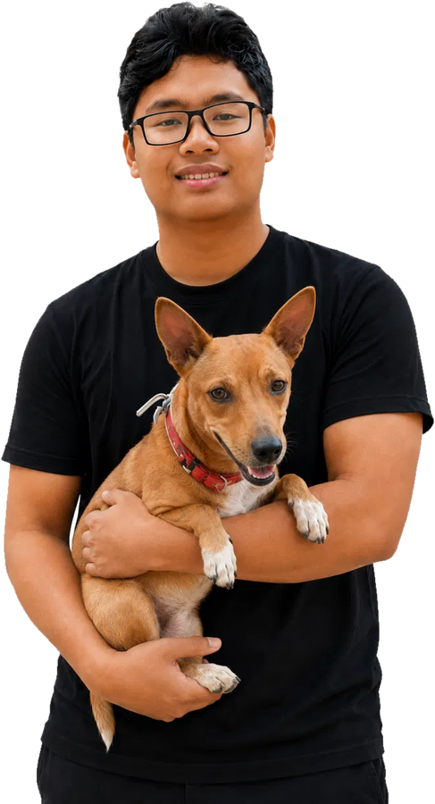 Samar Kishor holding his dog, Popo